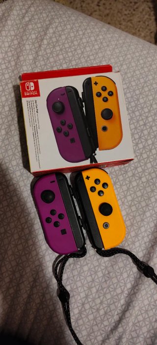 Joy-Con Nintendo Amarillo y Morado