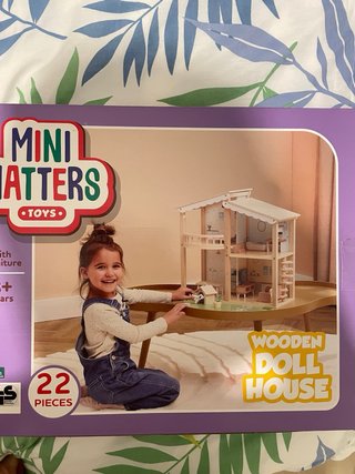 Casa de muñecas con accesorios