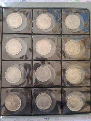 Lote de 12 monedas de 50 pesetas 1957.