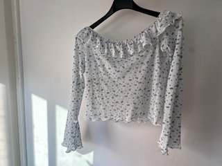 Blusa de manga larga con estampado floral