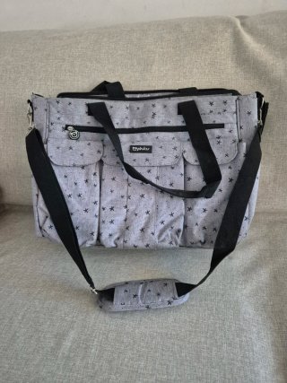 Bolso para cochecito gris con estrellas