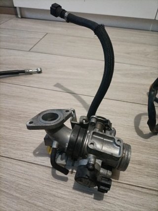 Cuerpo de inyección Suzuki Burgman