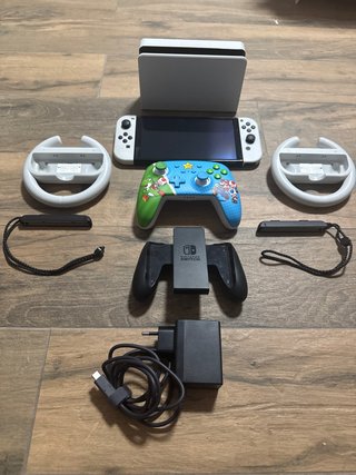 Nintendo Switch OLED con Mando Pro “negociable”