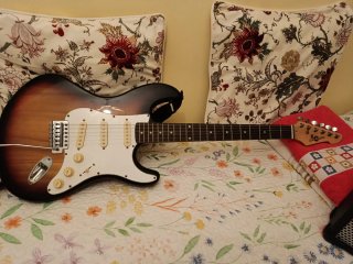 Guitarra eléctrica más amplificador