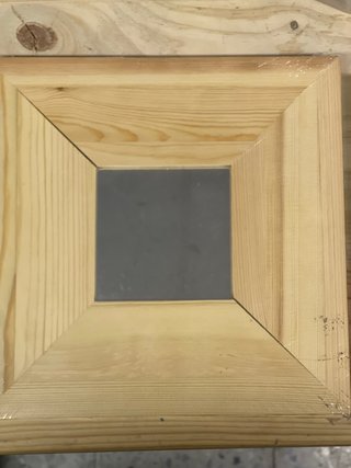 Espejo pequeño IKEA con marco de madera